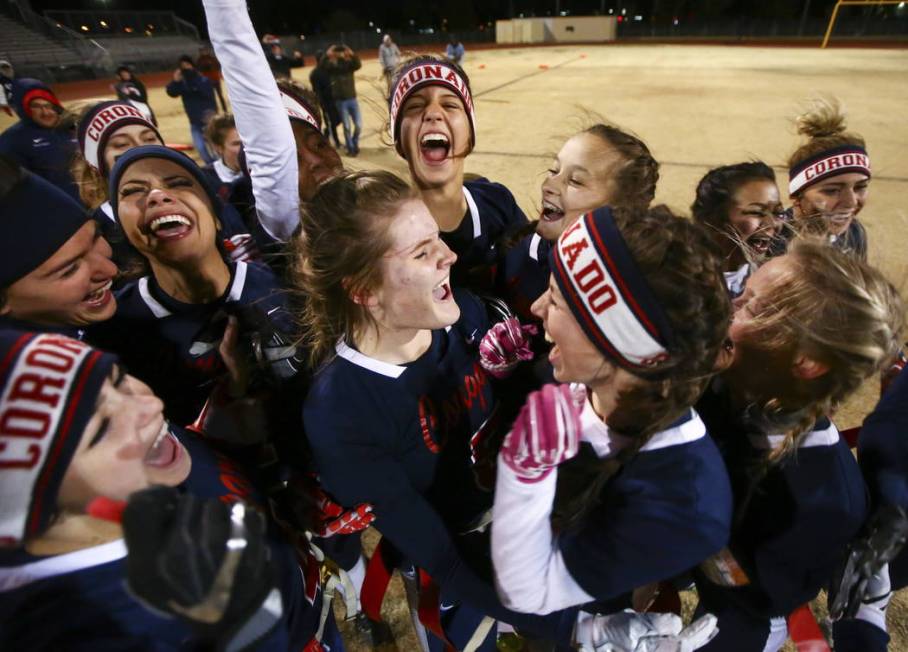 Coronado’s Ashley Hafemann (5), center, and Coronado’s Marissa Pollak (16), cent ...