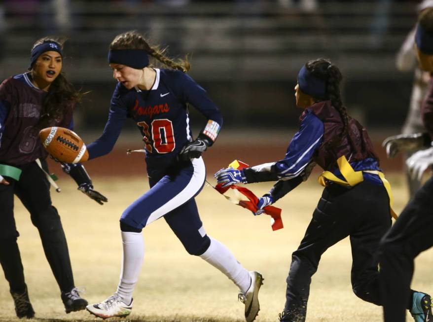 Coronado’s Reagan Raimer (10) gets tagged out by Shadow Ridge’s Dayvian Diaz (1) ...