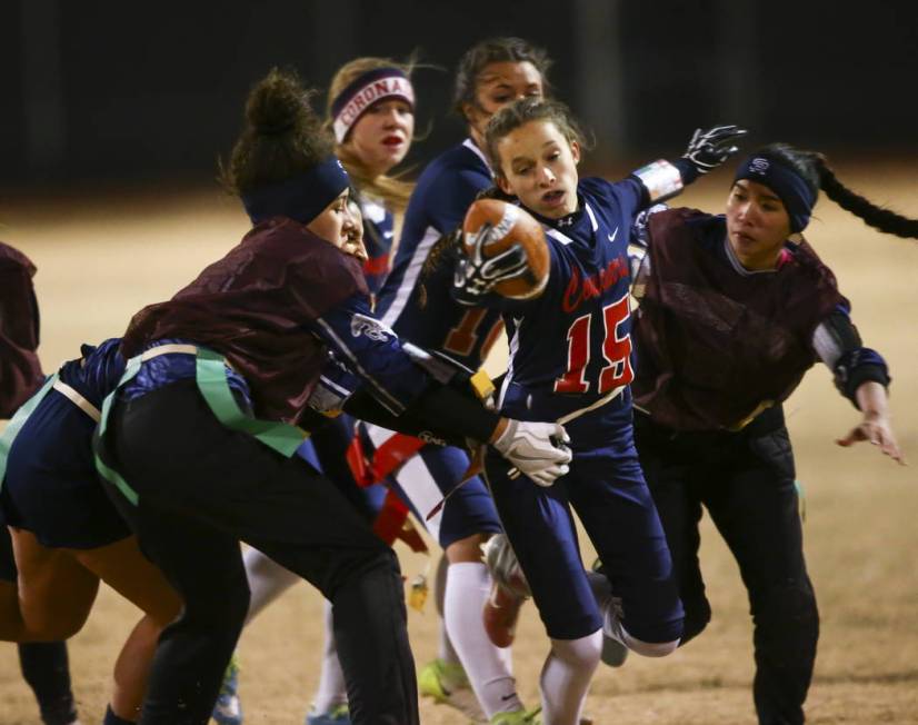 Coronado’s Erin Shannon (15) comes under pressure from Shadow Ridge’s Alex McGri ...