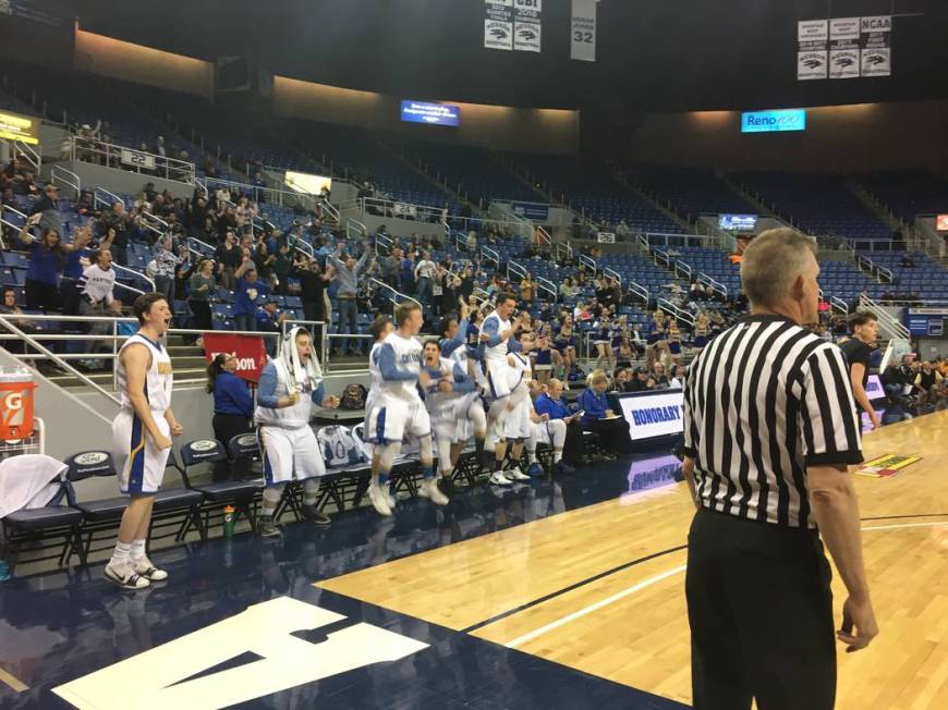 Pahranagat Valley’s bench reacts after tying the game in the fourth quarter against Mi ...