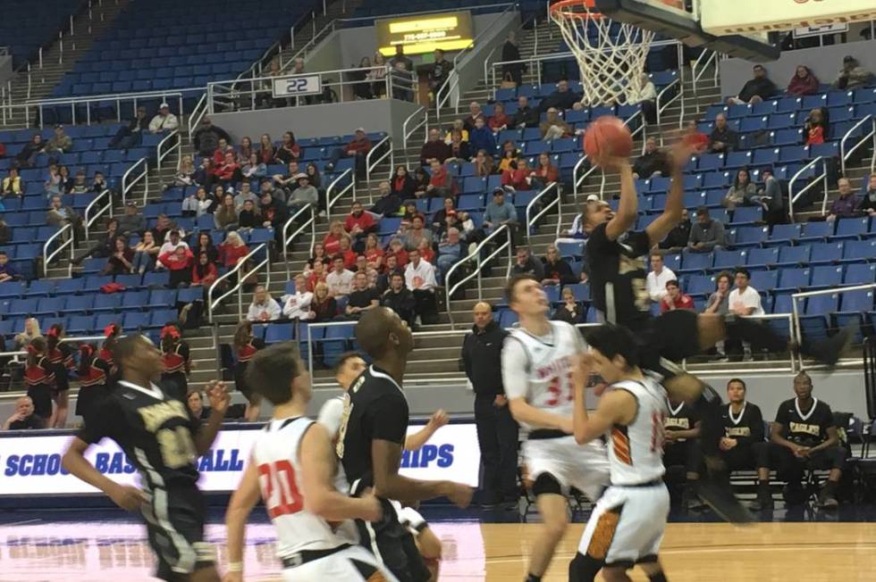 Spring Mountain’s Shawn Shumpert goes up for a shot during the team’s Class 1A s ...