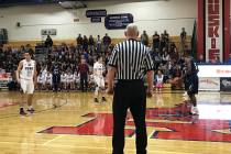 Cheyenne senior guard Kavon Williams dribbles against Elko’s 2-3 zone defense in the f ...