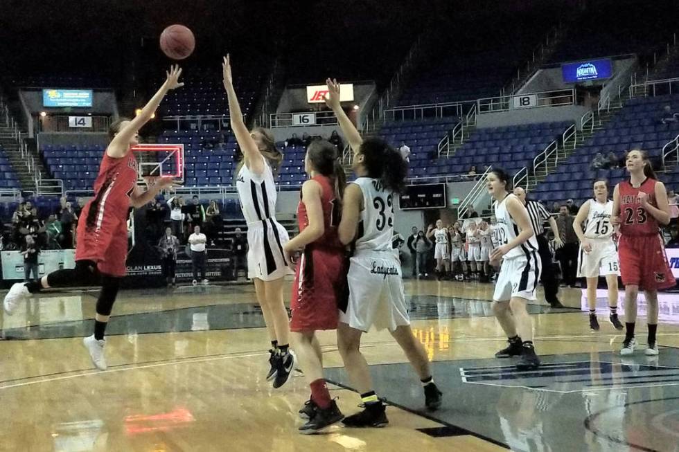 Lincoln County’s Brynlee Wadsworth tries a desperation shot at the buzzer during the C ...