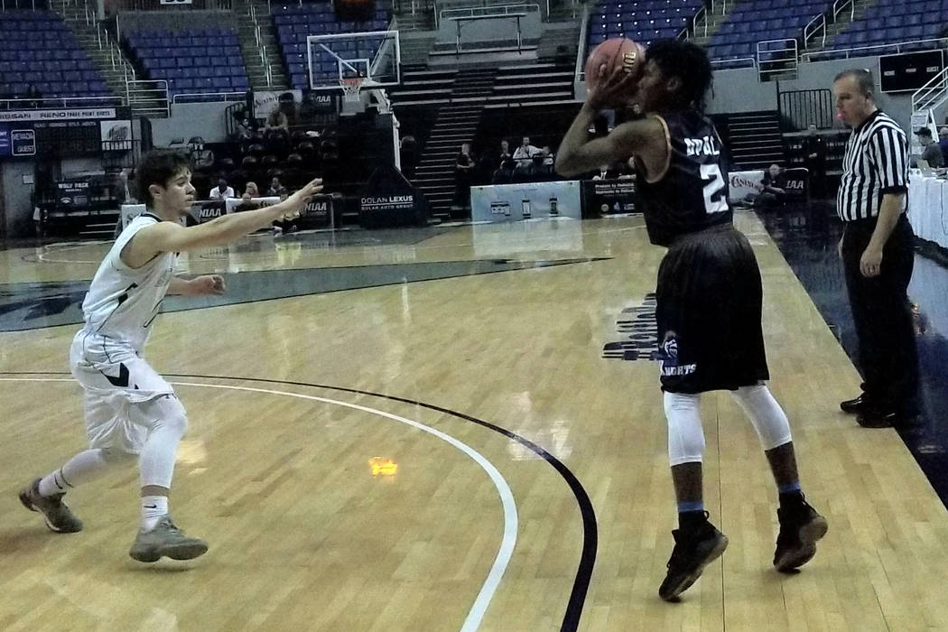 Democracy Prep’s Akeemis Williams takes a 3-pointer against Battle Mountain at Lawlor ...