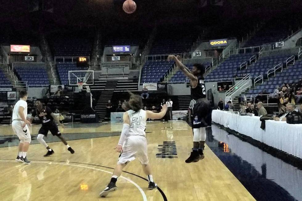 Democracy Prep’s Akeemis Williams takes a 3-pointer over Battle Mountain’s Mason ...