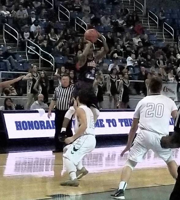 Democracy Prep’s Najeeb Muhammad pulls up over Battle Mountain’s Gabriel Naveran ...