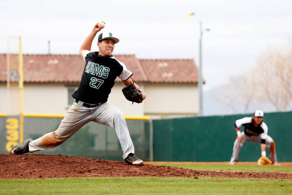 Rancho Rams’ Anthony Guzman (27) pitches against the Arbor View Aggies at Desert Oasis ...