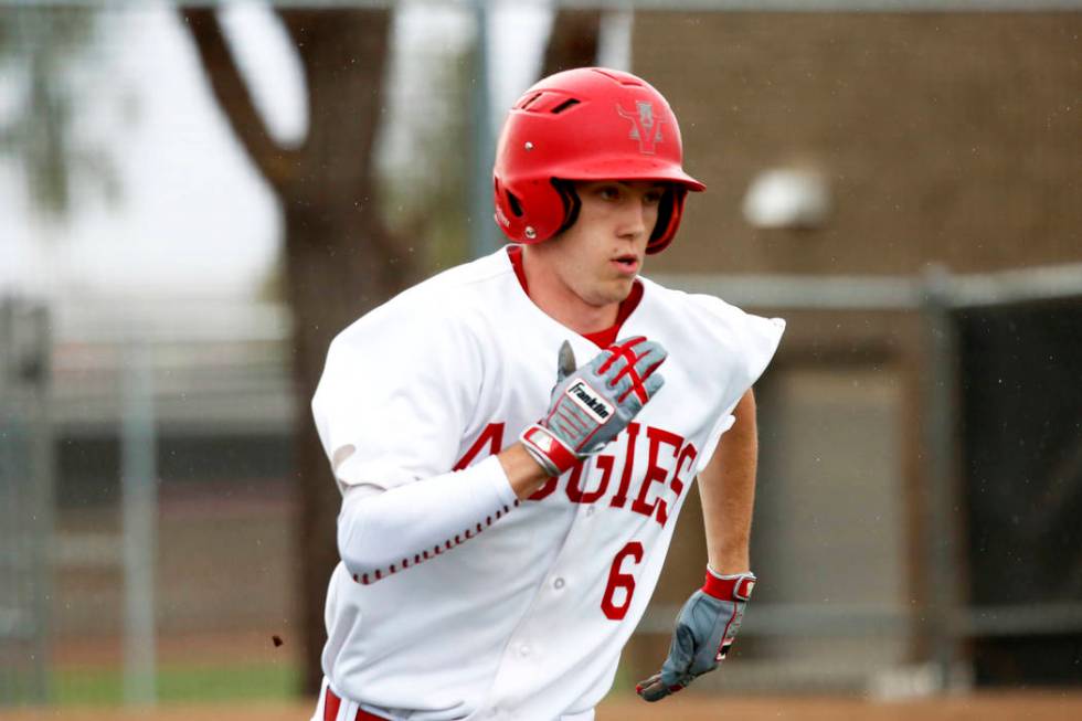 Arbor View Aggies’ Ryan Lystlund (6) runs to second base against the Rancho Rams at De ...