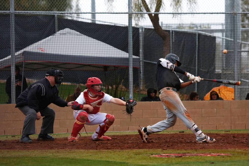 Rancho Rams’ Jimmy Gamboa (99) swings during a game against the Arbor View Aggies at D ...