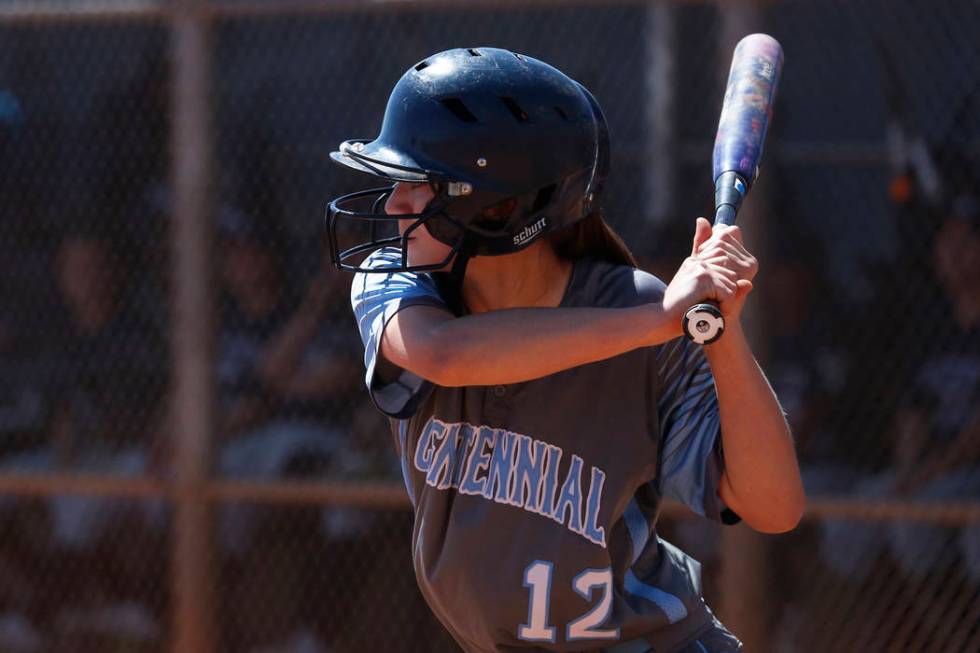 Centennial’s outfielder Abby Hanley (12) bats against North High School in the third i ...