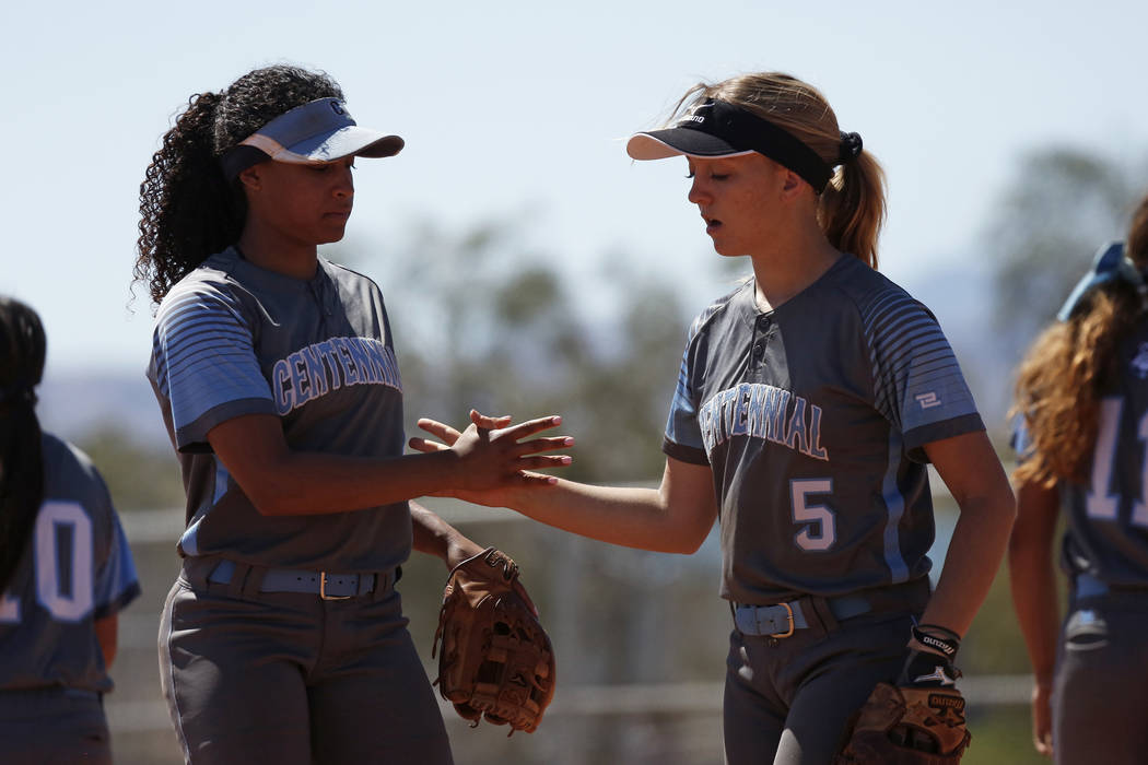 Centennial’s Kiana Tate (4) and Seanna Simpson (5) congratulate each other after a pla ...