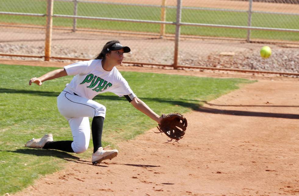 Palo Verde right fielder Alyssa Lybbert attempts to catch a foul ball in the first inning of ...