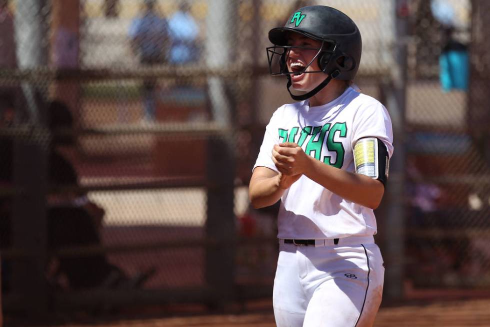 Palo Verde’s Makall Whetten celebrates scoring in the third inning of a softball game ...