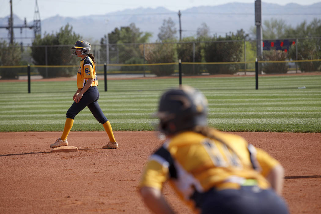 Jordan Moorhead (10) waits to run to third as teammate Lily Ofman (11) anticipates the next ...