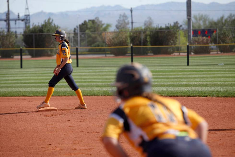 Jordan Moorhead (10) waits to run to third as teammate Lily Ofman (11) anticipates the next ...