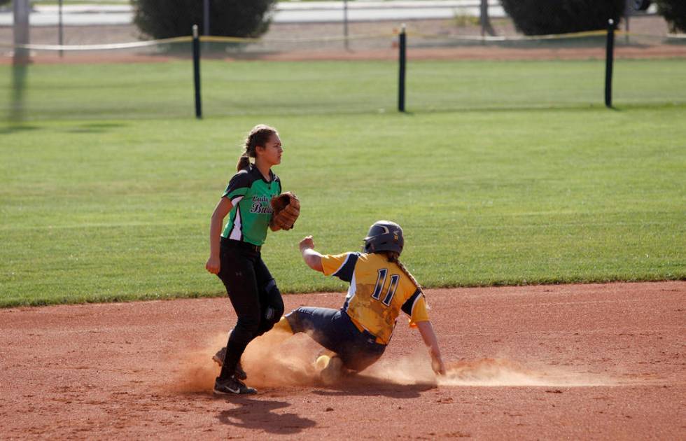 Boulder City High School’s Lily Ofman (11) slides to second plate as Virgin Valley Hig ...