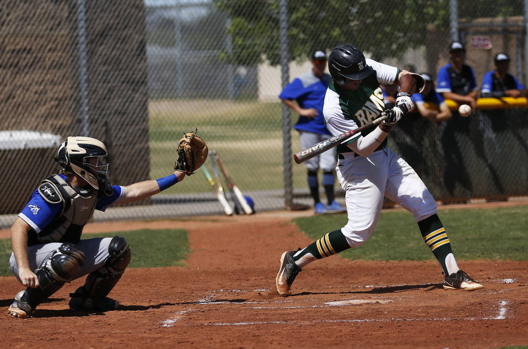 Rancho’s shortstop Edarian Williams (32) swings against Basic at Rancho High School in ...