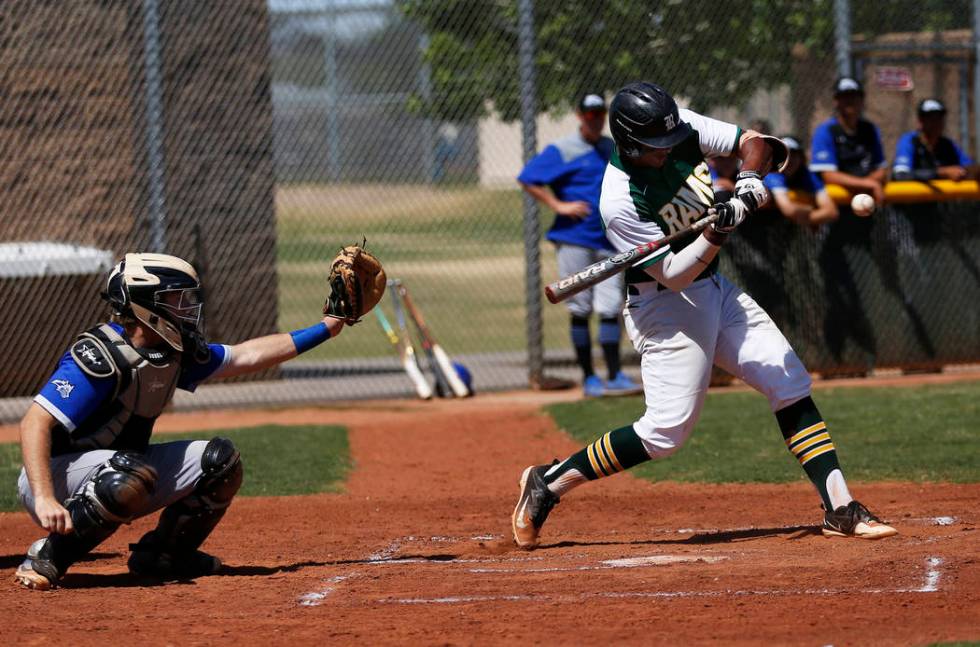 Rancho’s shortstop Edarian Williams (32) swings against Basic at Rancho High School in ...