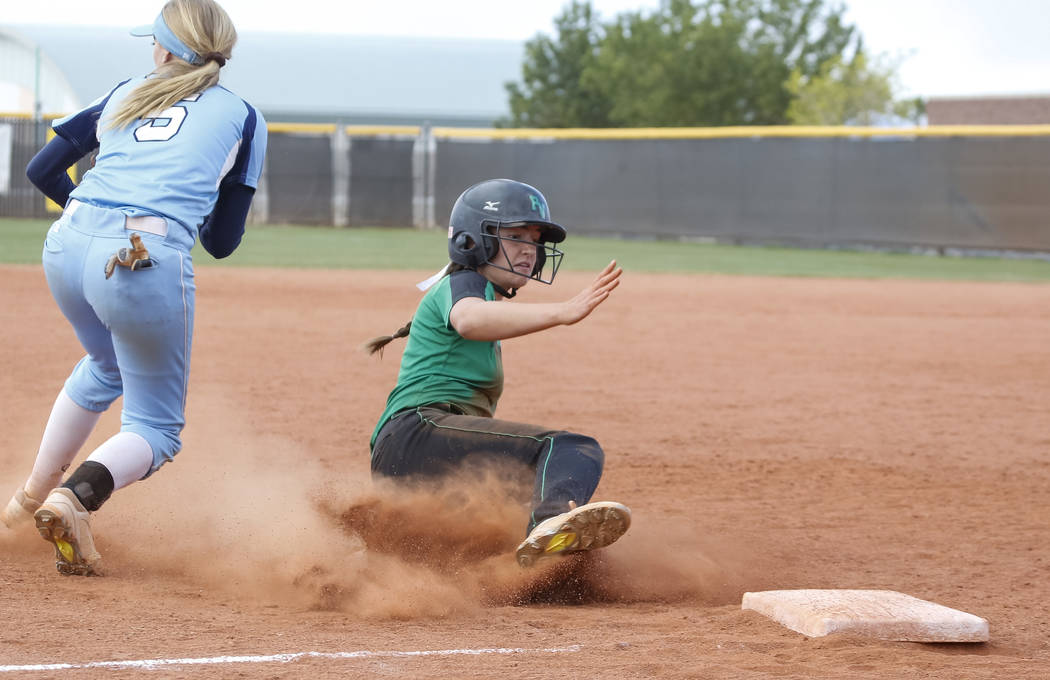 Palo Verde’s Makall Whetten slides safely into third base against Centennial’s S ...