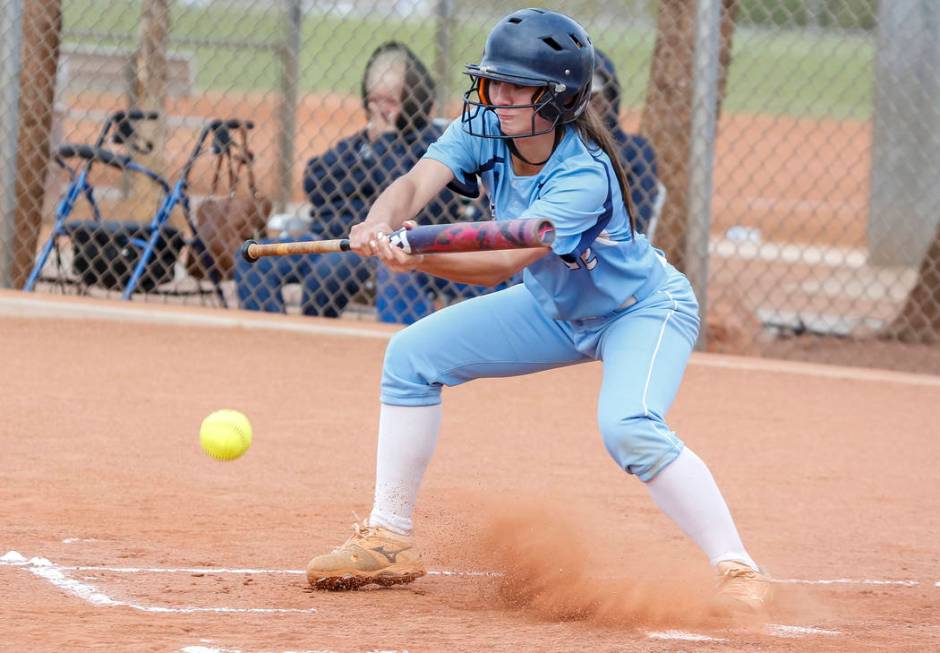 Centennial’s Abby Hanley bunts the ball during a softball game at at Palo Verde H ...