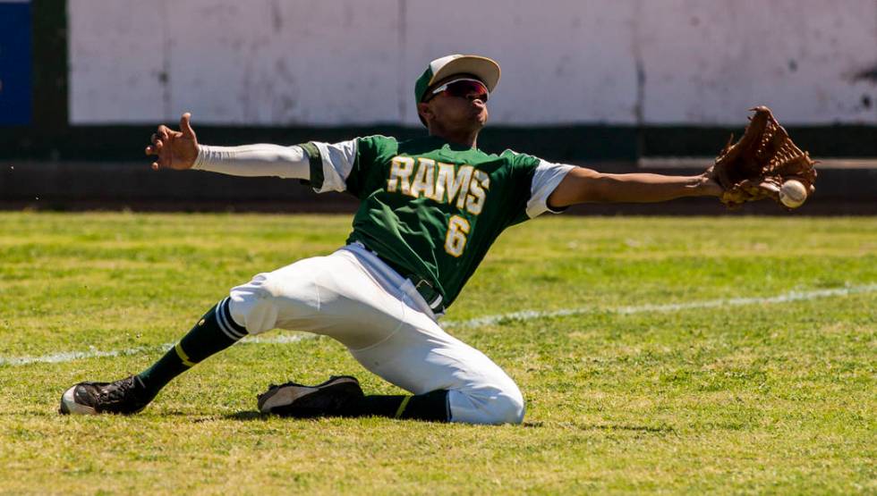 Rancho right fielder Kagen Kennedy misses a pop fly foul ball during the fourth inning while ...