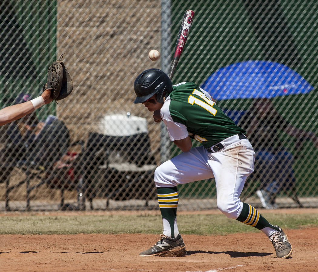 Rancho’s Joey Walls is hit in the head by a pitch during the fifth inning while playin ...