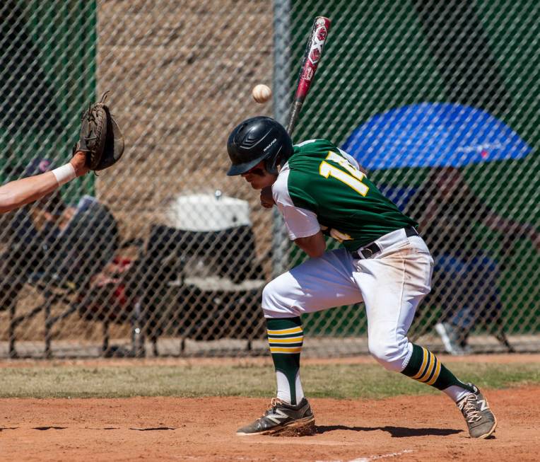 Rancho’s Joey Walls is hit in the head by a pitch during the fifth inning while playin ...