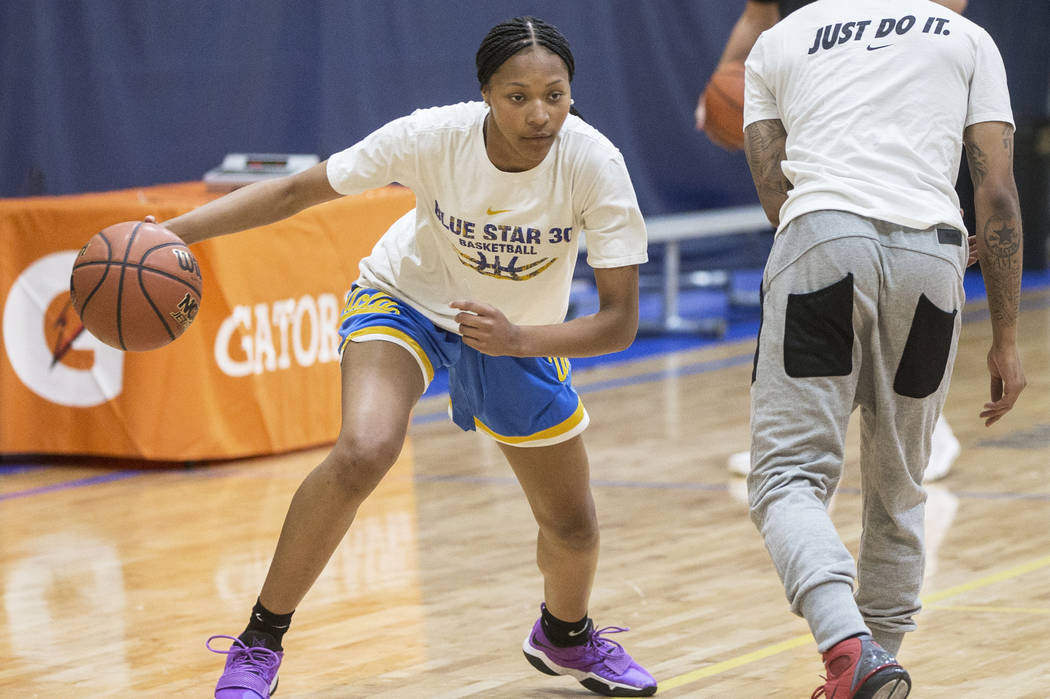 Centennial High School freshman point guard Taylor Bigby works out at Tarkanian Basketball A ...