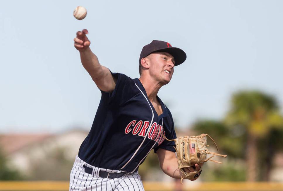 Coronado starting pitcher Kyle Hall (4) throws a pitch in the first inning during the Cougar ...