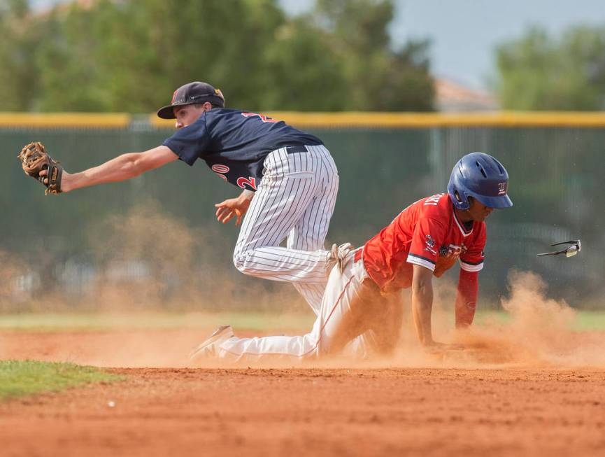 Coronado second baseman Taylor Darden (2) beats Liberty’s Kaeden Camat-Toki (14) to th ...