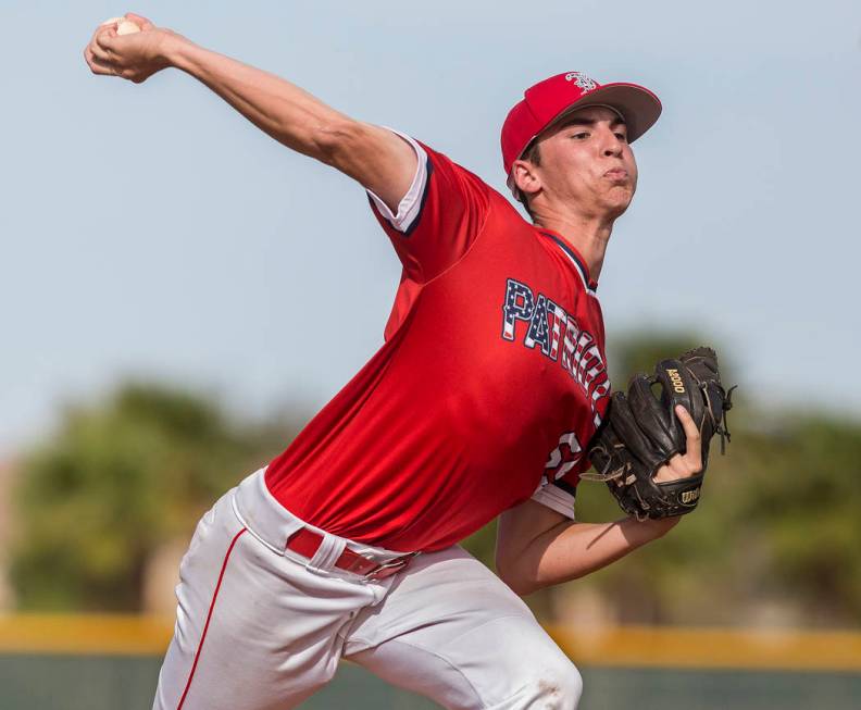 Liberty pitcher Garrett Maloney (55) makes a pitch in the second inning during the Patriots ...