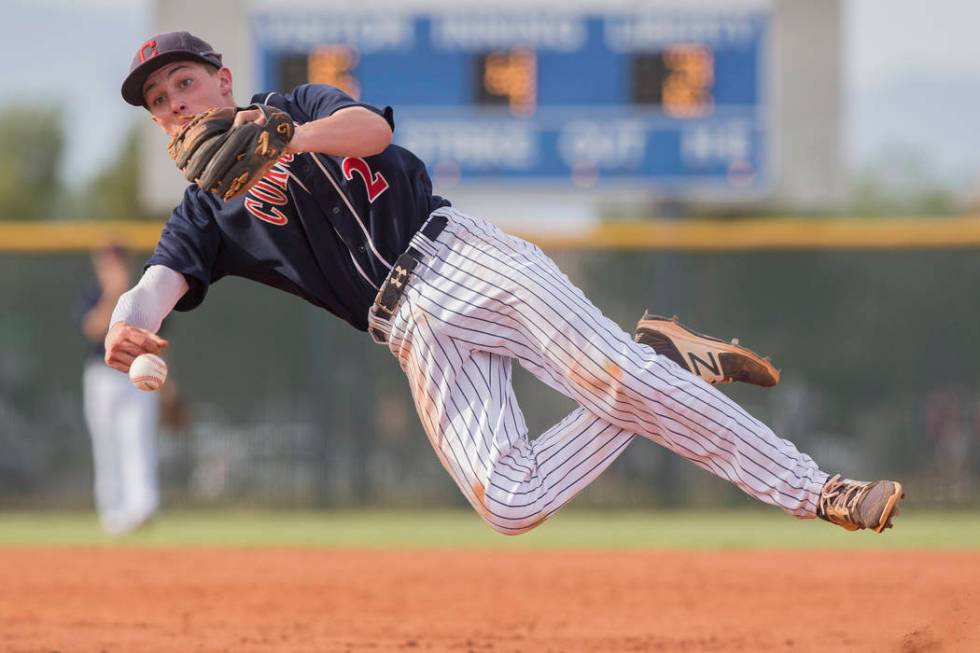 Coronado second baseman Taylor Darden (2) makes a leaping throw in the fourth inning during ...