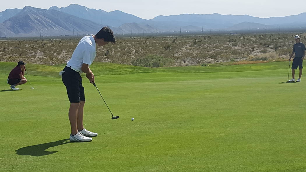 Foothill’s Noah MacFawn putts on the 15th hole Tuesday during the Class 4A Sunrise Reg ...