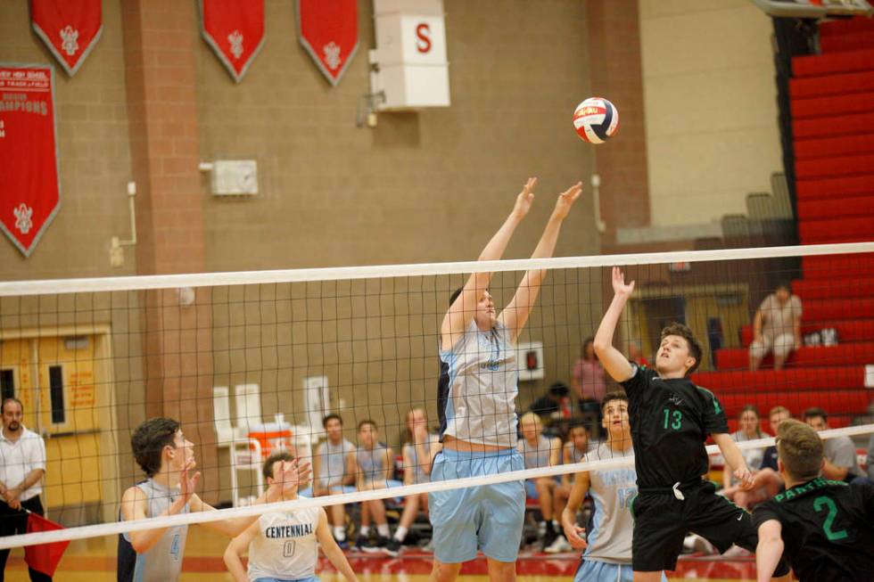 Centennial High School’s Tyler Godown (16) spikes the ball against Palo Verde High Sch ...