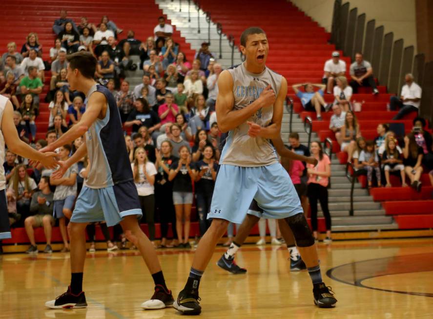 Centennial High School’s Teon Taylor (13) reacts after scoring in the Sunset Region bo ...