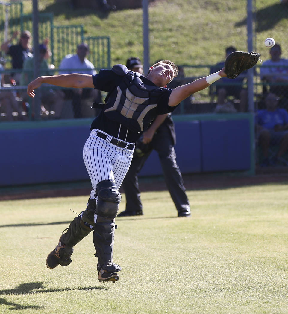 Coronado’s Braeden Ewing (13) comes up short on a fly ball from Rancho during the Suns ...