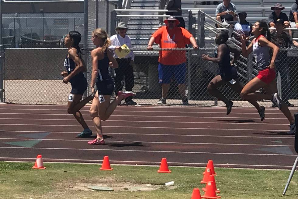 Sprinters, including Arbor View’s Hannah Esparza, compete in the 200-meter dash in the ...