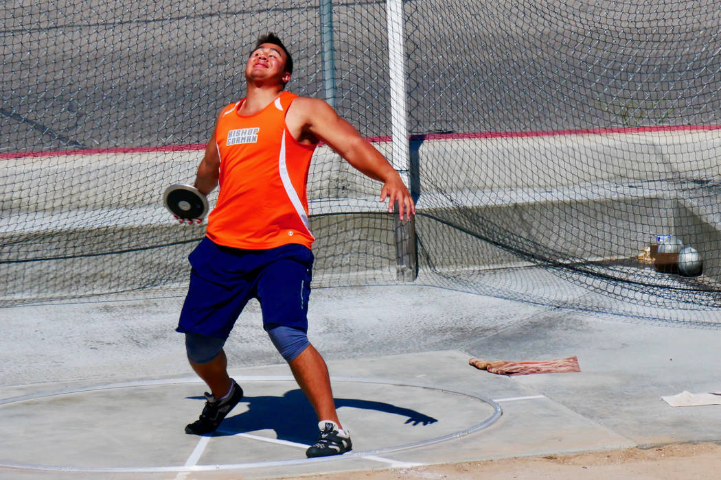 Bishop Gorman senior Jacob Isaia prepares to throw the discus in the Sunset Region track mee ...