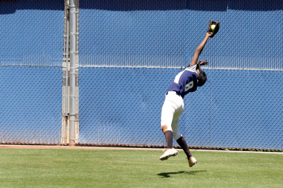 Shadow Ridge Jasmine Martin (8) snags a deep fly ball during the 2018 NIAA Class 4A Sunset R ...