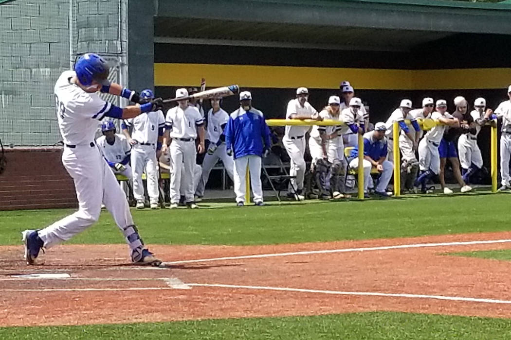 Basic’s John Howard Bobo takes a swing against Reno in the Class 4A state baseball tou ...