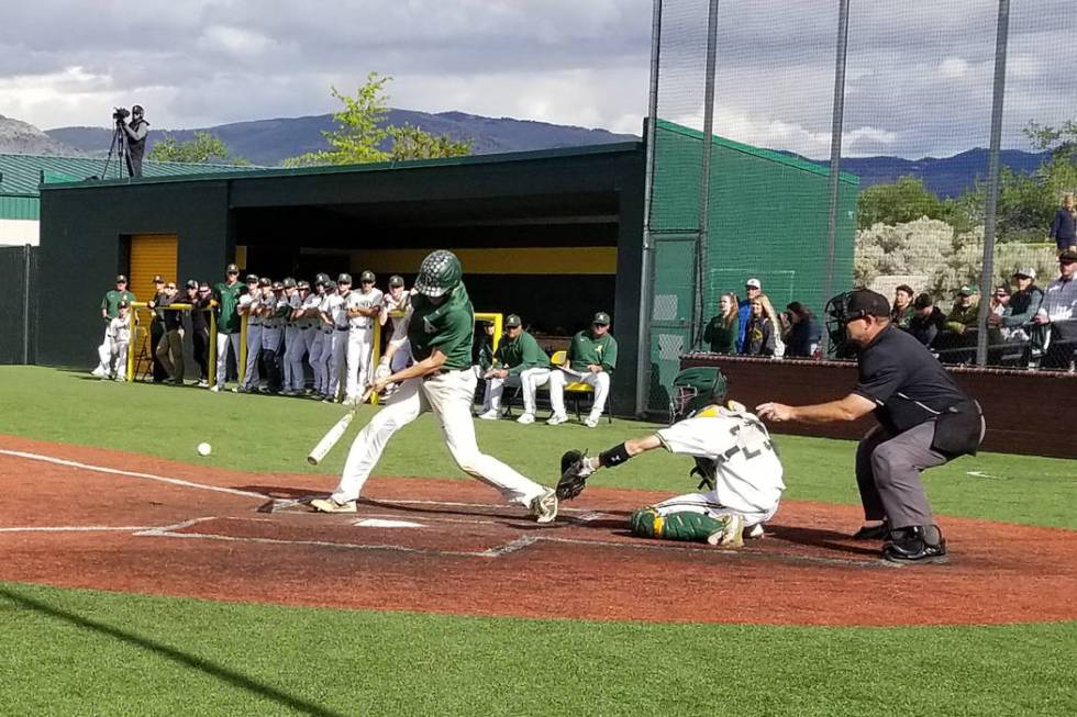 Palo Verde’s Peyton Cole hits the ball against Bishop Manogue in the Class 4A state ba ...