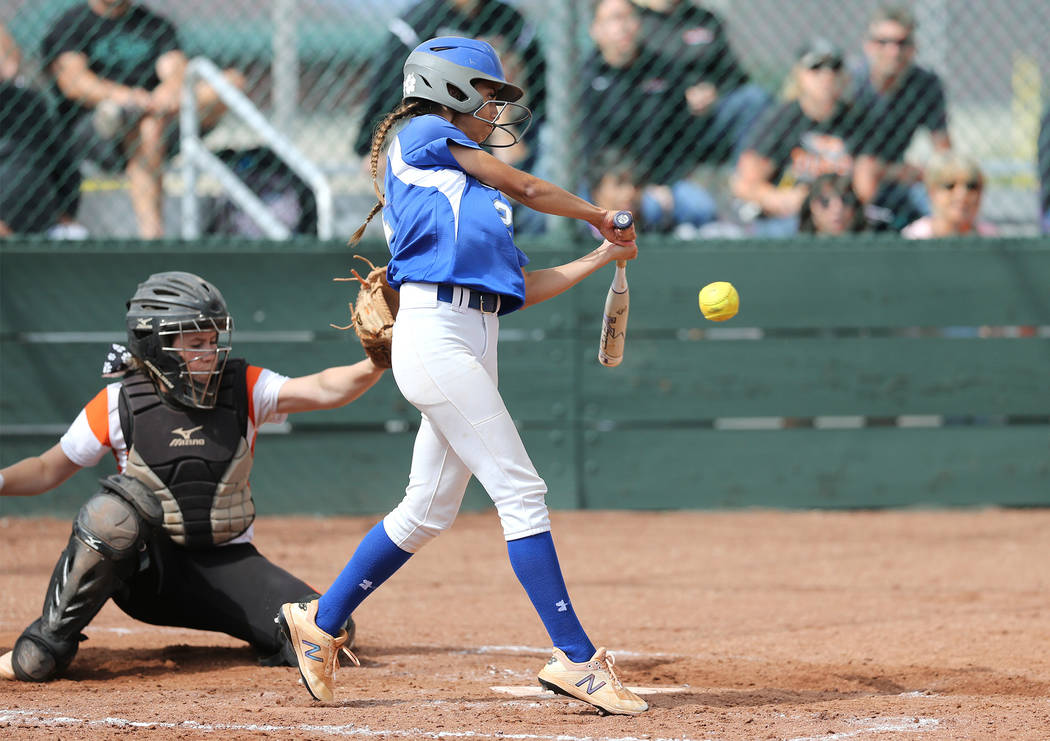 Basic Wolves’ Alyssa Ferguson hits against the Douglas Tigers during the NIAA 4A softb ...