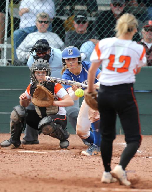 Basic Wolves’ Angela Santillanes hits against the Douglas Tigers in the NIAA 4A softba ...