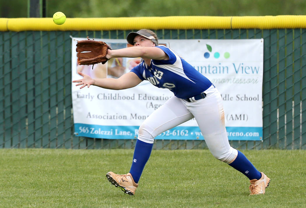 Basic Wolves’ Jordan Stinnett makes a catch in left field against the Douglas Tigers i ...