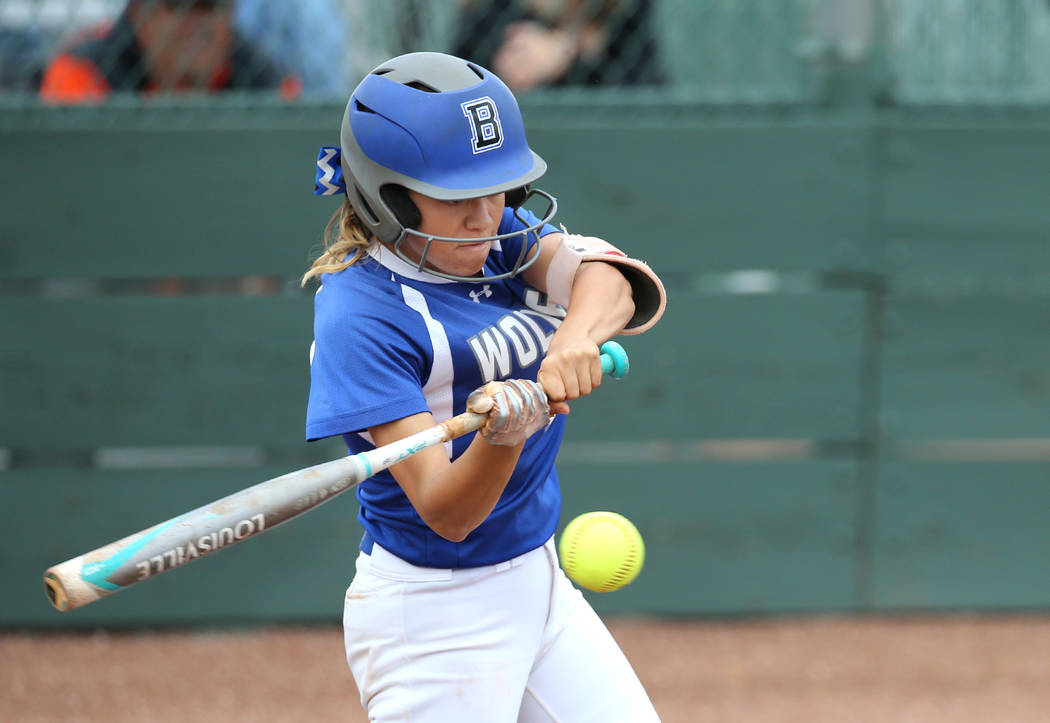 Basic Wolves’ Isabelle Morales hits against the Douglas Tigers in the NIAA 4A softball ...