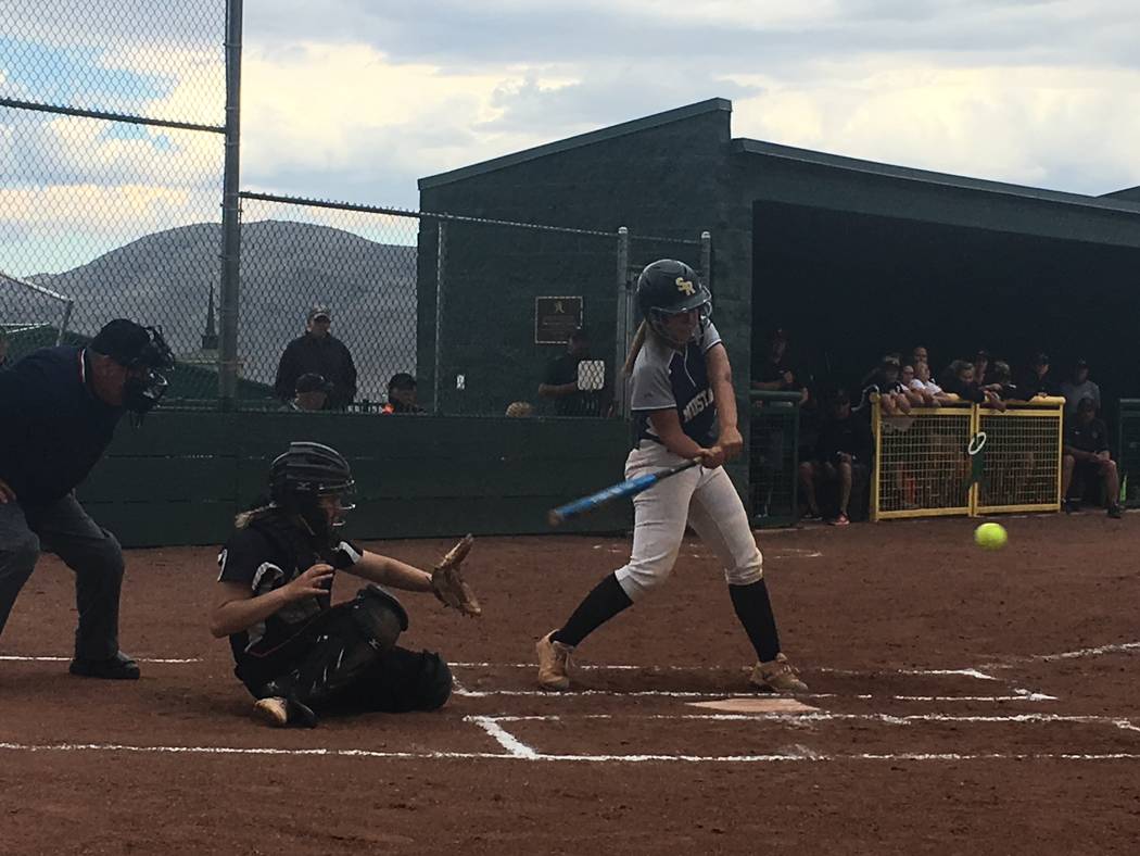 Shadow Ridge’s Caitlyn Covington swings at a pitch from Douglas in a Class 4A state so ...