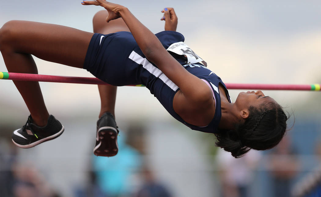 Centennial’s Anyese James-Kirkland competes in the high jump at the NIAA Track & F ...
