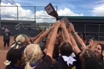 Pahranagat Valley’s softball team celebrates winning the Class 1A state softball champ ...