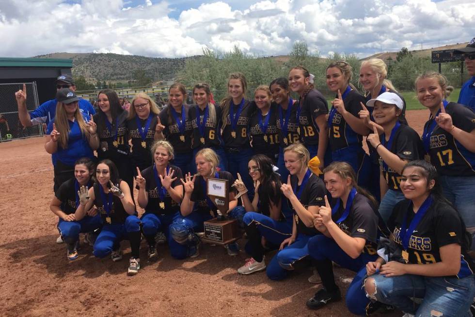 Pahranagat Valley’s softball team celebrates winning the Class 1A state softball champ ...