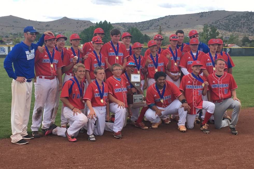 The Indian Springs baseball team poses with the Class 1A state title trophy after a 12-2 vic ...